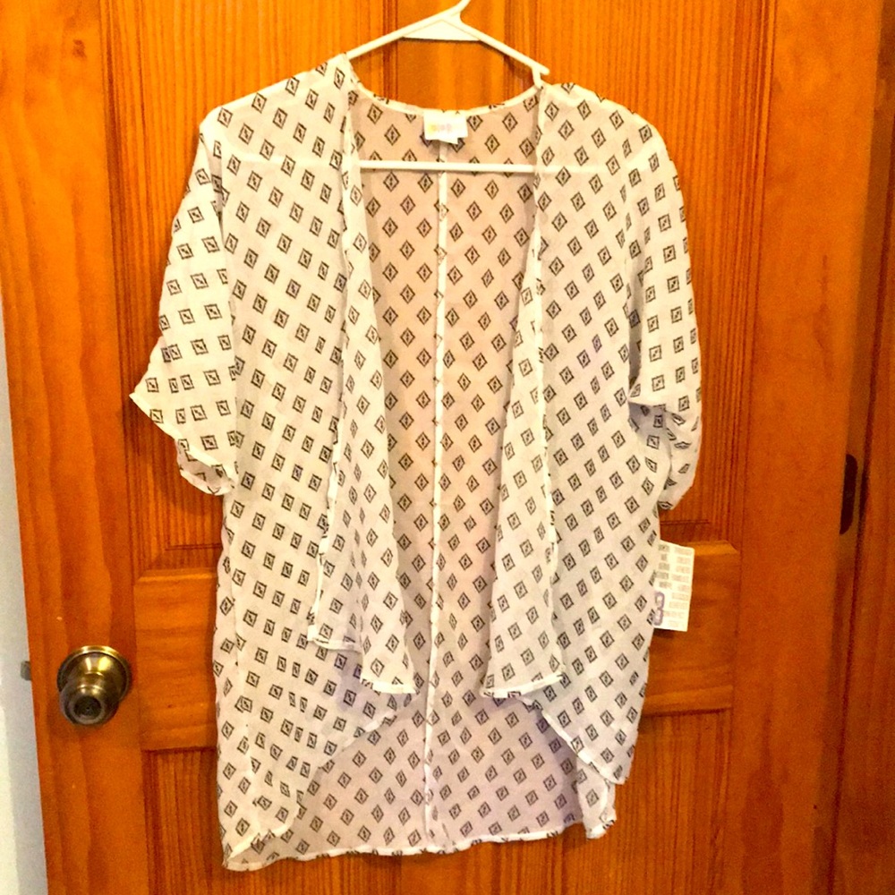 LuLaRoe black and white sheer top.